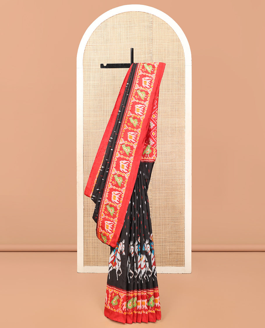 Black Pochampally Ikat Saree, Adorned with Buttas and Horse Rider Ikat Weave, a Contrast Ikat Animal Weave Border, Jaal Pallu, and a Contrast Blouse