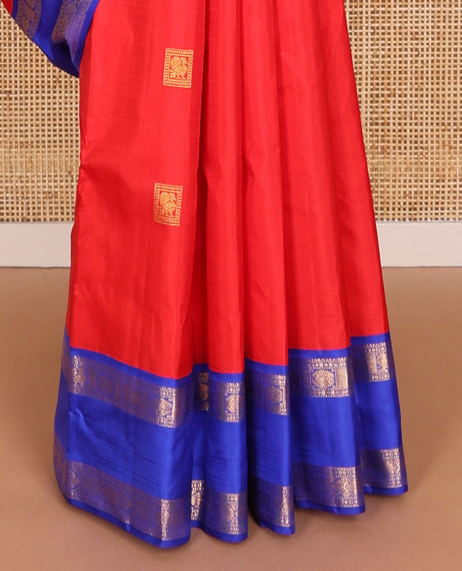 Red buttas kancheepuram silk saree with contrast rettai pettu border of poo chakram, mayil design & floral design pallu