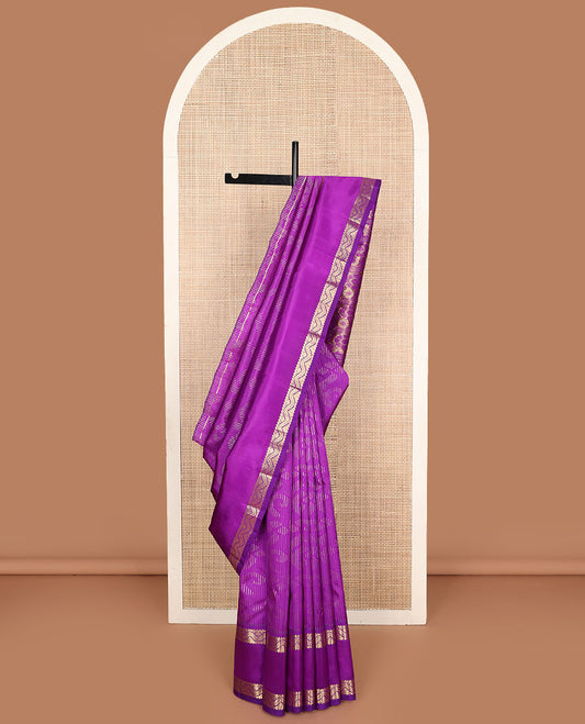 Purple zari buttas Kanchipuram silk saree, one-sided zari border of rekku, banaras, and neli designs, and floral design pallu