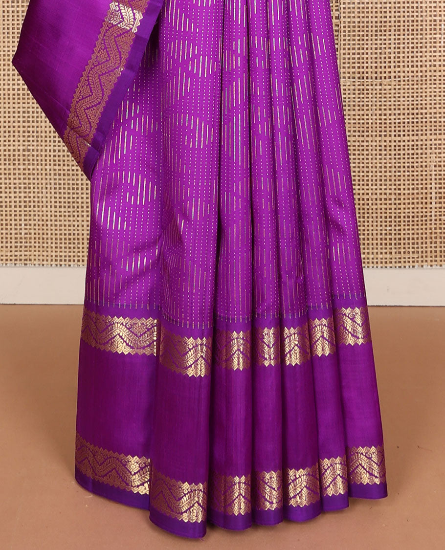 Purple zari buttas Kanchipuram silk saree, one-sided zari border of rekku, banaras, and neli designs, and floral design pallu