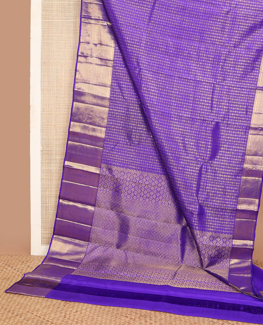 Blue jacquard silk saree, zari border of rekku, muthu, banaras & mayil kann & zari-rich pallu of jaal design