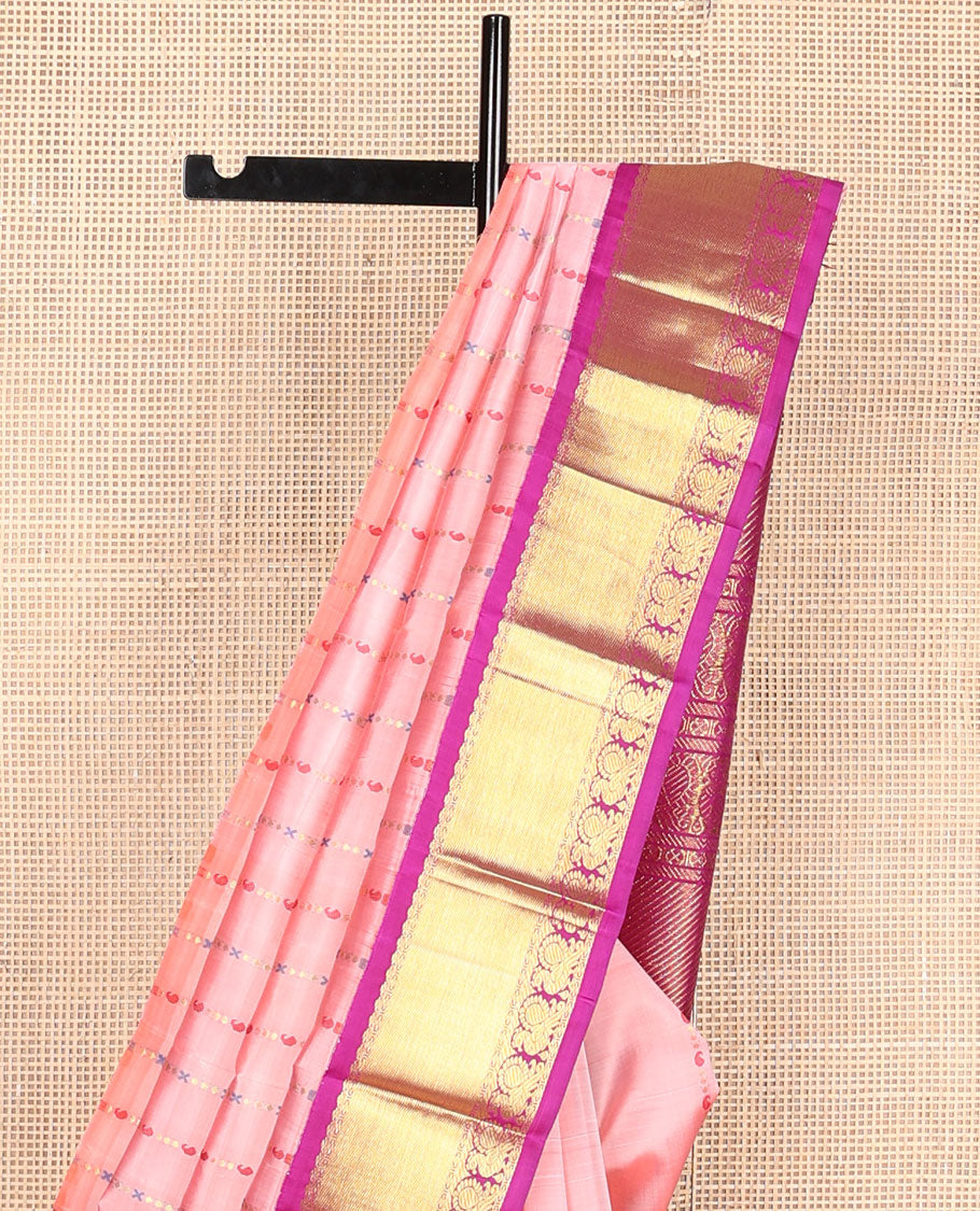 Peach Meena manga buttas kanchipuram silksaree, contrast one-sided korvai border & pallu of salngai,lavangam & mayil designs