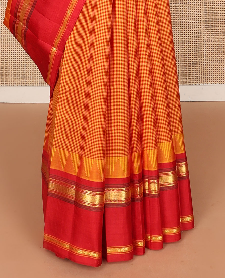 Orange micro-checked kanchipuram silk saree, contrast thazampoo rekku rettai pettu border of muthu & kathir designs & pillaiyar mokku pallu