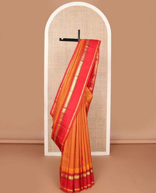 Orange micro-checked kanchipuram silk saree, contrast thazampoo rekku rettai pettu border of muthu & kathir designs & pillaiyar mokku pallu