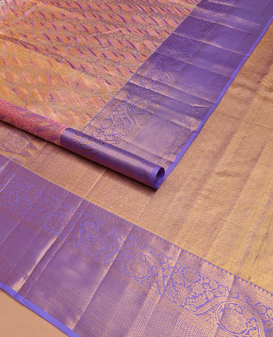 Pink Kanchipuram Tissue Silk Saree, Mesmerized with Jacquard Design on Its Body, Complemented by a Contrast Border of Thilakam, and Dhavana Kodi Designs, Pallu Steeped with Poun Designs, and Paired with a Contrast Blouse