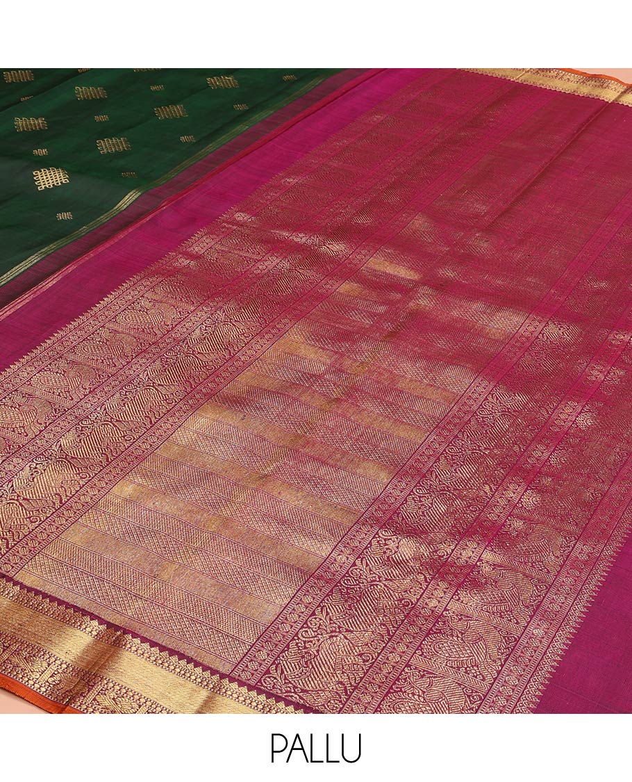Green Kanchipuram Soft Silk Saree Artfully Detailed with Kolam Buttas, Complemented by a Contrast Border of Thilakam Mokku, Muthu, Yaanai, and Mayil Designs, Zari-Rich Pallu of Mayil Kann Designs, and Paired with a Contrast Blouse