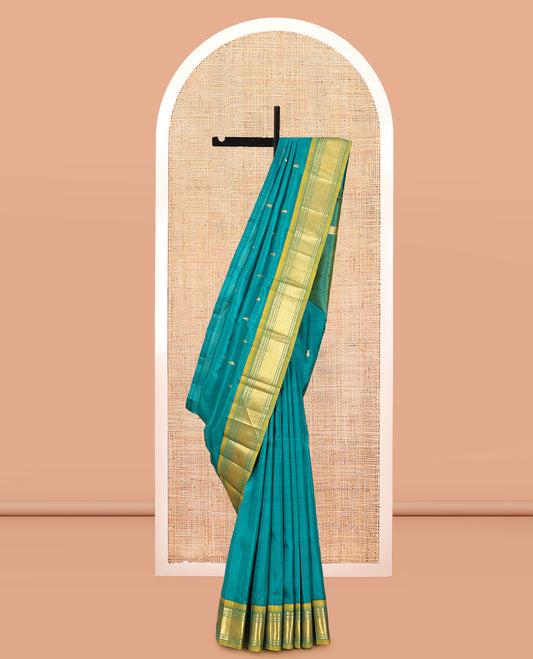 Green Kanchipuram Silk Saree, Adorned with Zari Buttas, Complemented by a Contrast Border of Panner Sombu, Banaras, and Mayil Kann Design, Pallu of Zari Design, and No Blouse