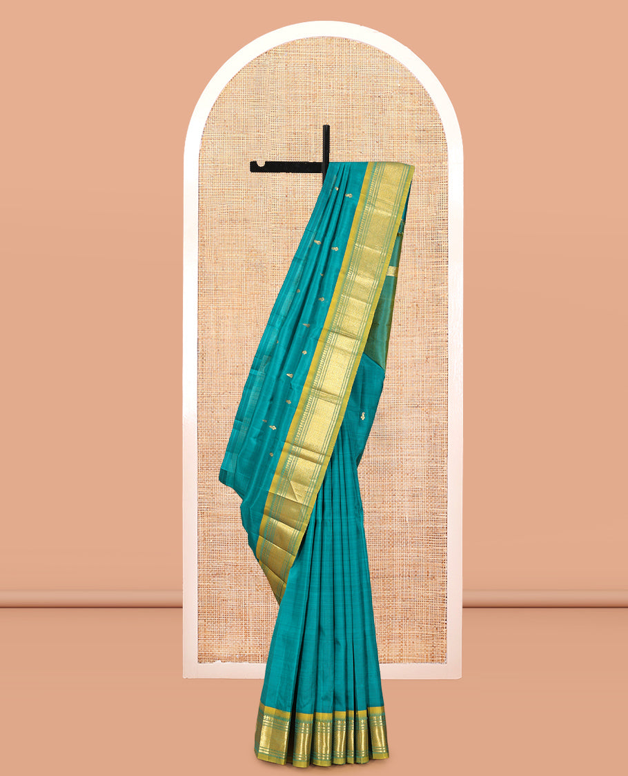 Green Kanchipuram Silk Saree, Adorned with Zari Buttas, Complemented by a Contrast Border of Panner Sombu, Banaras, and Mayil Kann Design, Pallu of Zari Design, and No Blouse