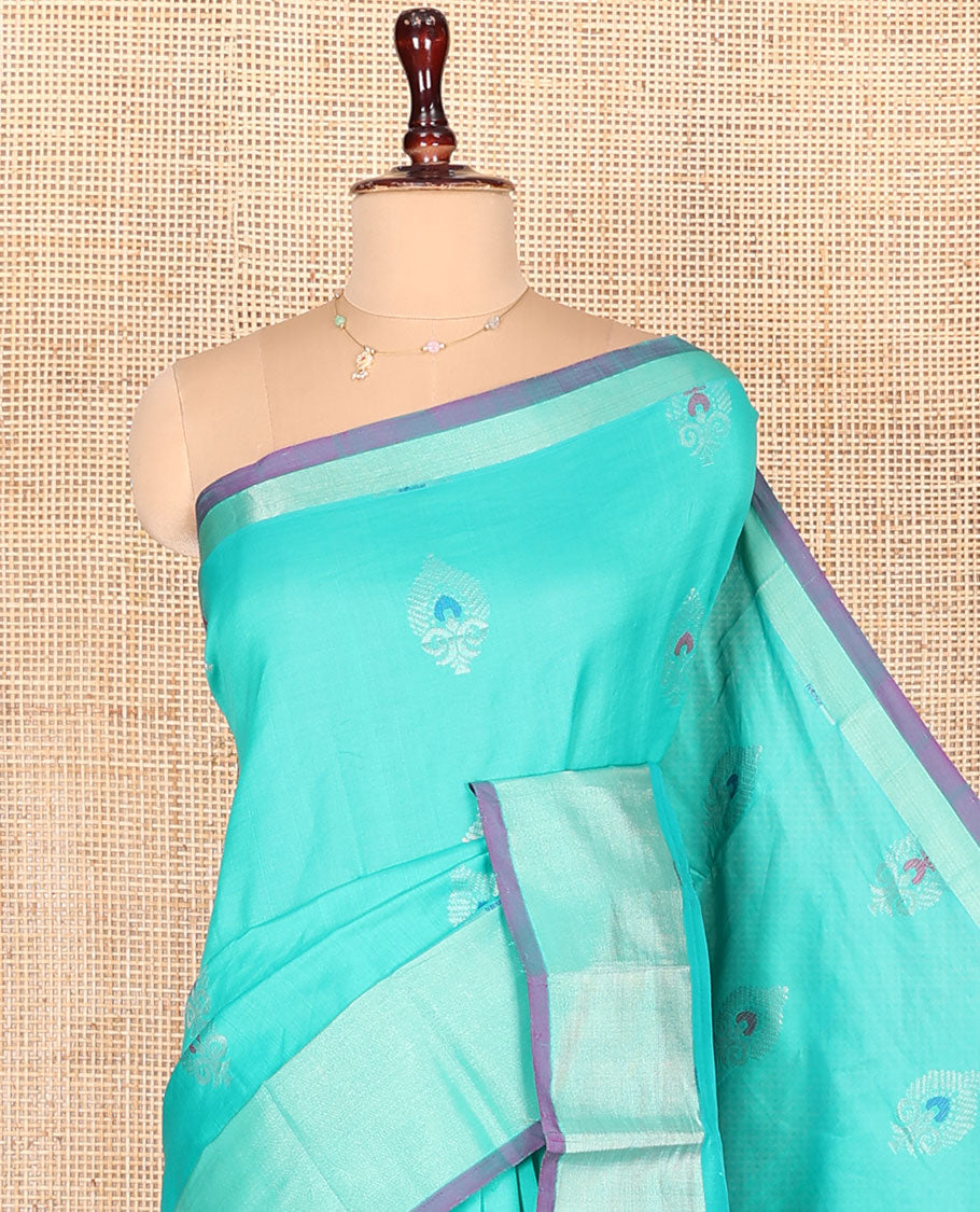 Turquoise Kuppadam Cotton Saree, Sparsely Woven with Meena Buttas All Over Its Body, Complemented by a Bavanji Border, Majestically Detailed Pallu, and Paired with a Contrast Blouse