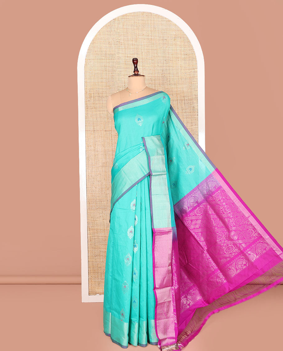 Turquoise Kuppadam Cotton Saree, Sparsely Woven with Meena Buttas All Over Its Body, Complemented by a Bavanji Border, Majestically Detailed Pallu, and Paired with a Contrast Blouse