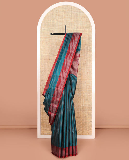Blue muthu striped soft silk saree, contrast tree motifs border, and pallu of geometric patterns