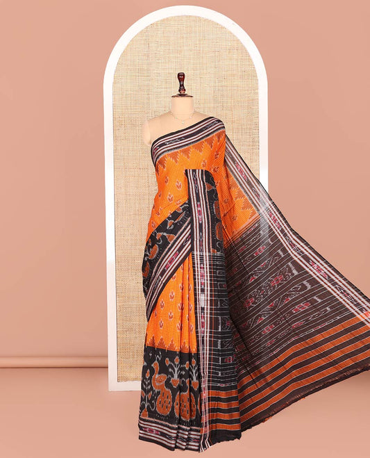 Orange Odisha Cotton Saree, Bedecked with Buttas and Checks on Its Body, Complemented by a Contrast Border of Ikkat Weave Peacocks, Pallu of Ikkat Weave, and Comes Without a Blouse