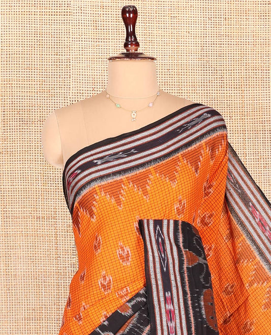Orange Odisha Cotton Saree, Bedecked with Buttas and Checks on Its Body, Complemented by a Contrast Border of Ikkat Weave Peacocks, Pallu of Ikkat Weave, and Comes Without a Blouse