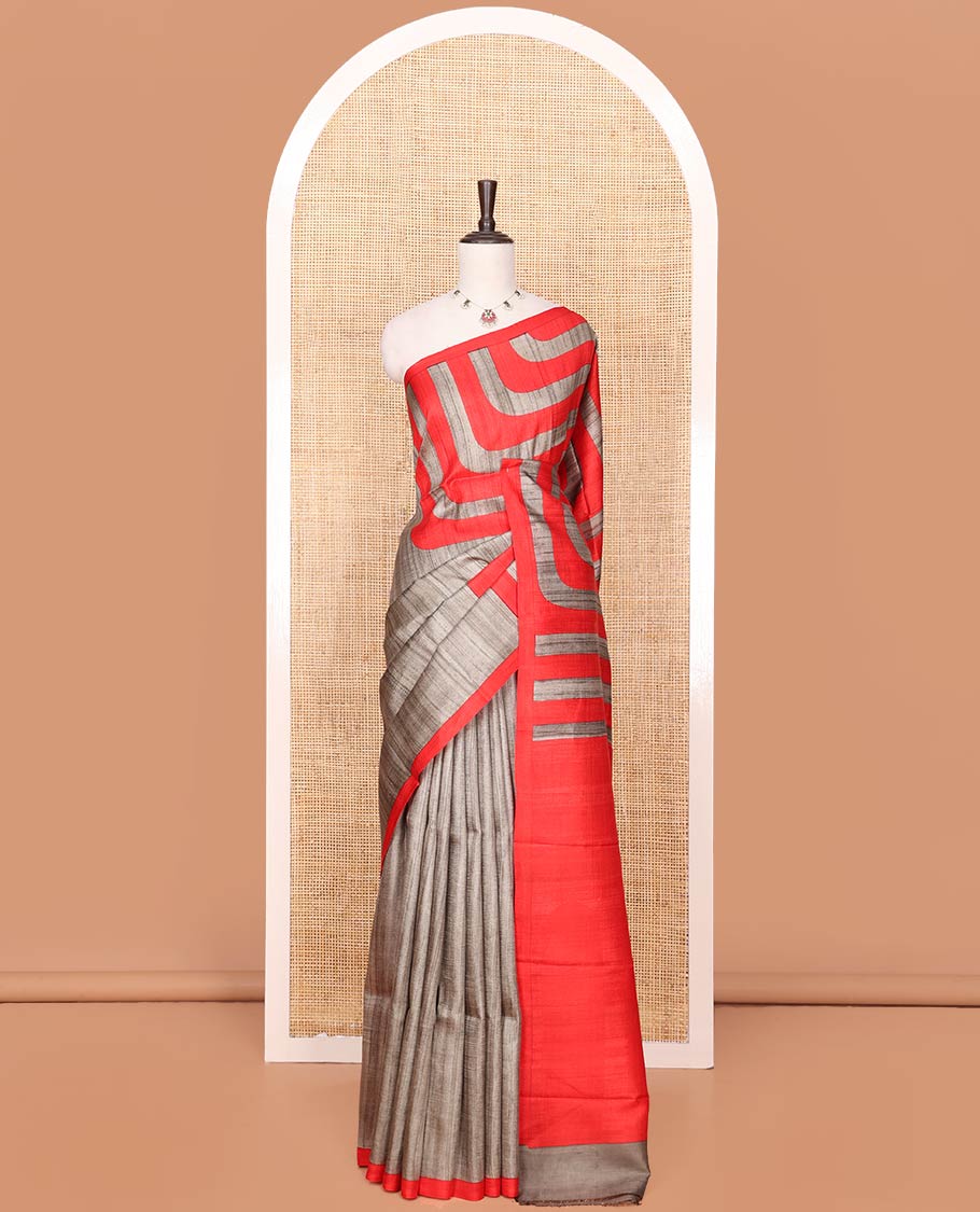 Grey Printed Silk Saree Featuring Thick Zig-Zag Stripes Running on the Body, Complemented with a Contrast Piping Border, Pallu of Geometric Print, and Paired with a Contrast Plain Blouse