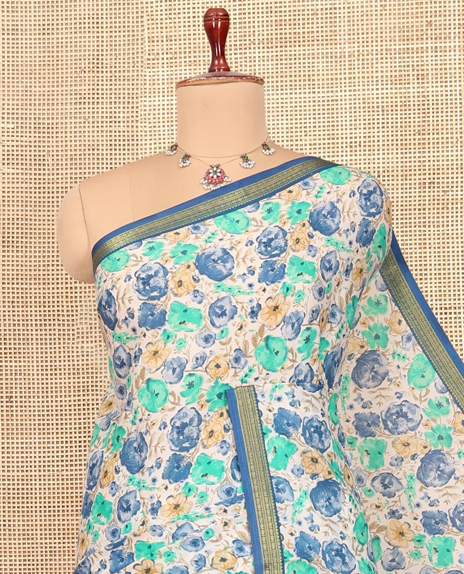 Blue Printed Silk Saree, Graced with Floral Print, a Traditional Zari Border, Floral Pallu, and a Matching Blouse