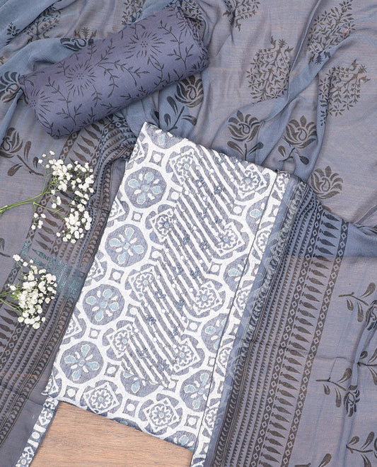 White cotton chudidhar material set, batik-style printed & neck work top, contrast floral-theme printed bottom & dupatta