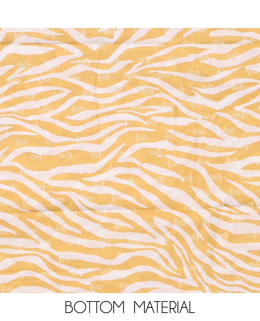 Yellow cotton material churidar set, floral printed with neck embroidered top, tiger skin style printed bottom, and dupatta of floral and animal print