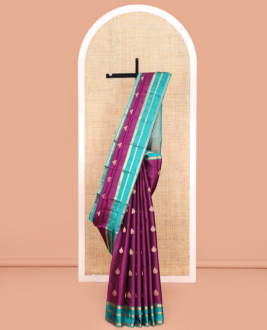 Purple Budget Silk Saree, Spotlighted with Zari Buttas On Its Body, Complemented by Contrast Border of Rekku, Laddu Kamalam, Mayil, and Yaanai Designs, Grand Jaal Pallu, and Paired with a Contrast Blouse