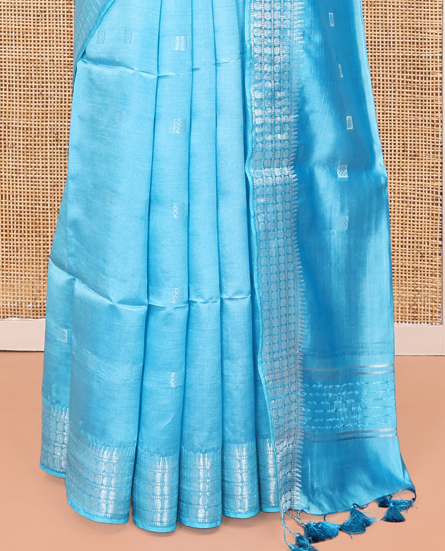 Blue Banana Pith Saree, Subtly Sparkled with Square Buttas All Over Its Body, Sparsely Woven Temple Border of Rudraksham Designs, Pallu of Buttas, and Paired with a Matching Blouse
