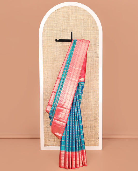 Green Vasundhara Silk Saree, Enriched with Zari Checked Design on Its Body, Complemented by Contrast Border of Manga, Muthu, Rudraksham, and Yaali Designs, Grandly Woven Jaal Pallu, and Paired with a Contrast Blouse