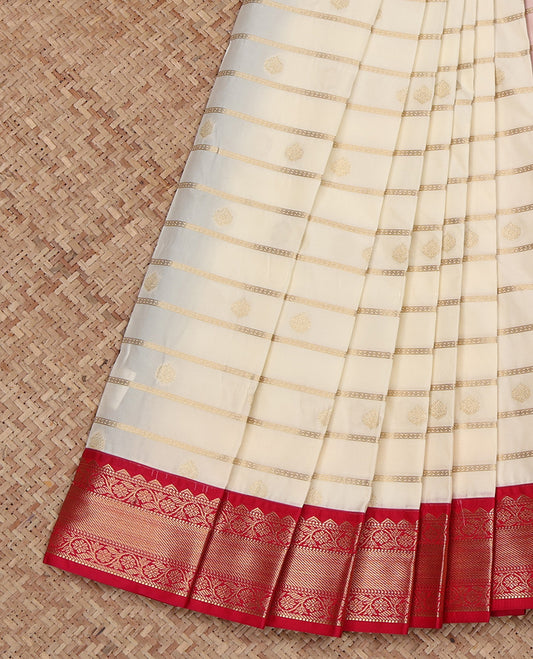 Cream Budget Silk Saree, Delicately Woven with Zari Buttas and Zari Stripes All Over Its Body, Complemented by a Contrast Traditional Zari Design Border, Grand Jaal Pallu, and Paired with a Contrast Blouse
