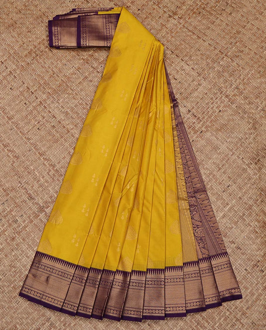 Yellow Budget Silk Saree, Subtly Sparkled with Zari Buttas on Its Body, Complemented by a Contrast Traditional Zari Design Border, Intricately Designed Pallu, and Paired with a Contrast Blouse