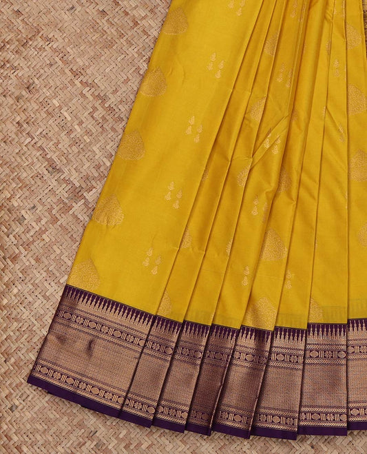 Yellow Budget Silk Saree, Subtly Sparkled with Zari Buttas on Its Body, Complemented by a Contrast Traditional Zari Design Border, Intricately Designed Pallu, and Paired with a Contrast Blouse