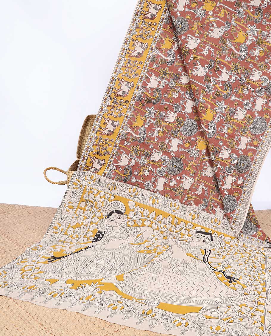 Brown village-theme machine-printed kalamkari cotton saree,  contrast Pichwai cow border & human figurines pallu