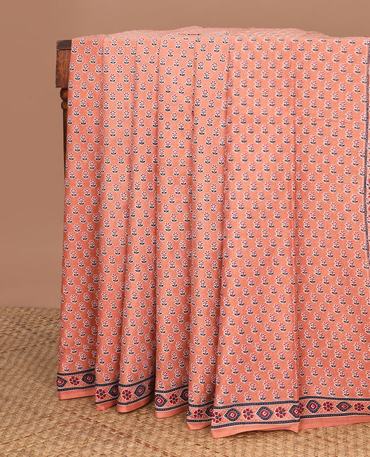 Light orange floral motifs printed mul mul cotton saree, ajrakh printed border & ajrakh printed pallu