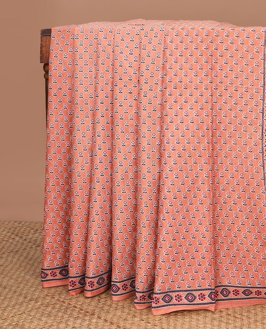 Light orange floral motifs printed mul mul cotton saree, ajrakh printed border & ajrakh printed pallu