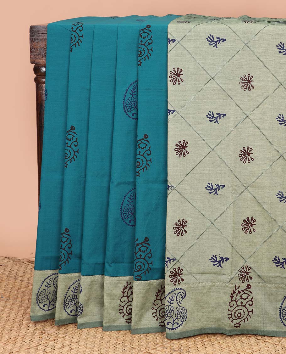 Blue unique motifs printed poly cotton saree, contrast floral-paisley border, and butta enclosed jaal pallu