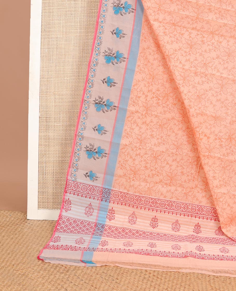 Pale orange floral printed chirala cotton saree, contrast floral printed border & geometric patterned pallu