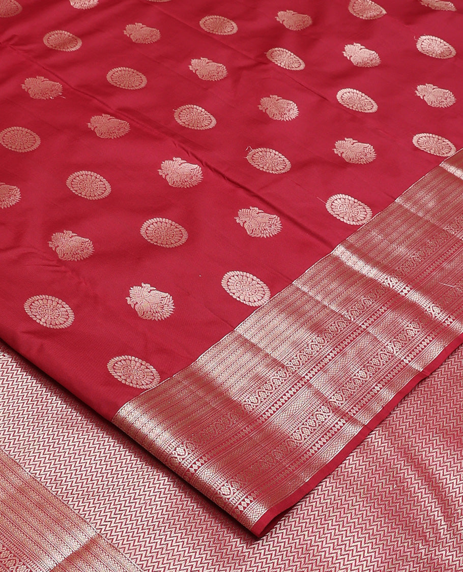 Maroon iruthalai pakshi and chakram Vasundhara silk mix, traditional motifs zari woven border, and vanki pallu