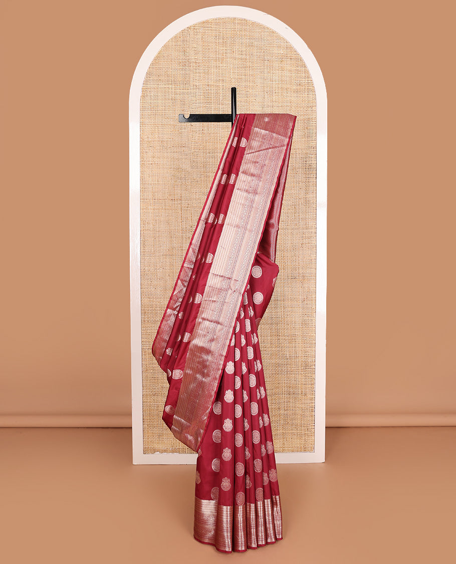 Maroon iruthalai pakshi and chakram Vasundhara silk mix, traditional motifs zari woven border, and vanki pallu