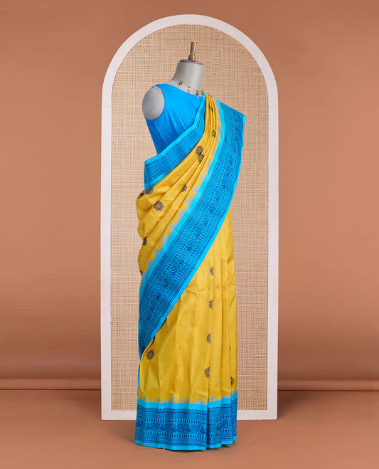Yellow sunburst-style buttas gadwal silk saree, contrast traditional design border & pallu of jaal designs