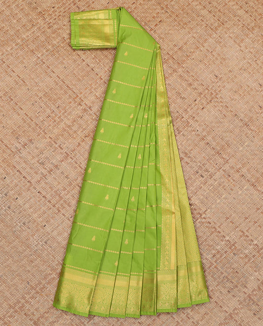 Green Budget Silk Saree, Decked Up with Zari Buttas, Complemented by Traditional Zari Border, a Jaal Pallu and a Matching Blouse