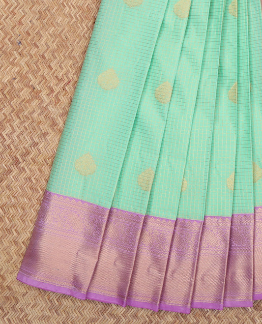 Turquoise Budget Silk Saree, Enriched with Zari Buttas and Checks, a Contrast Traditional Zari Border, Grand Pallu, and a Contrast Blouse