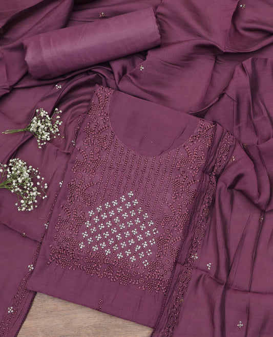 Purple material chudidar set, self-color thread and sequins embroidered top, plain bottom and sequins work dupatta