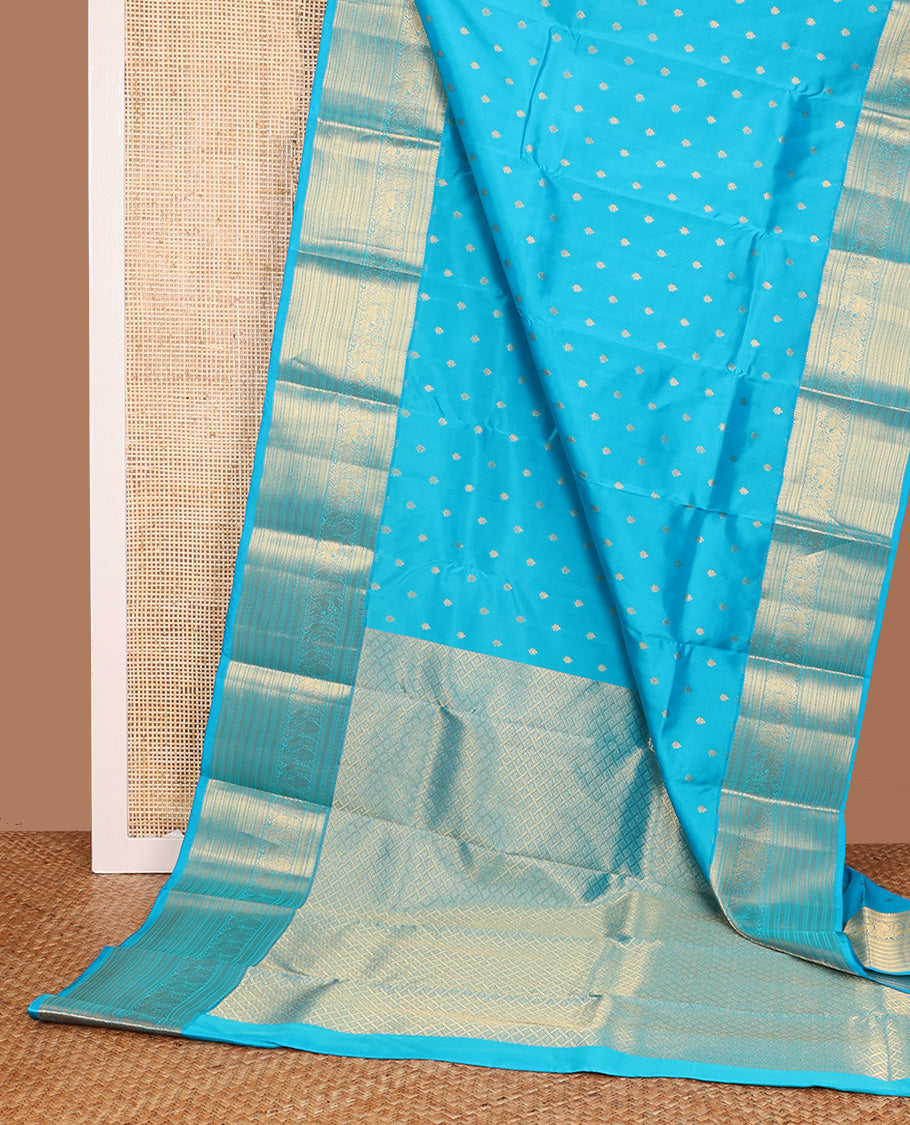 Blue zari buttas Vasundhara silk mix, traditional zari border of mayil, yaali, and muthu designs and paiyaadi kattam pallu