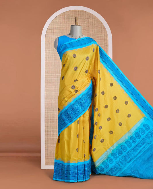 Yellow sunburst-style buttas gadwal silk saree, contrast traditional design border & pallu of jaal designs