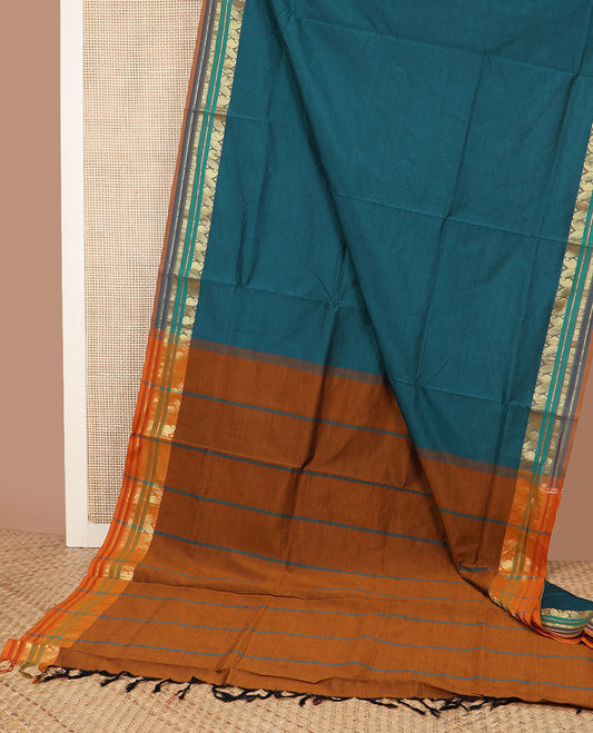 Blue plain design poly cotton saree, contrast traditional zari design border & pallu of stripes