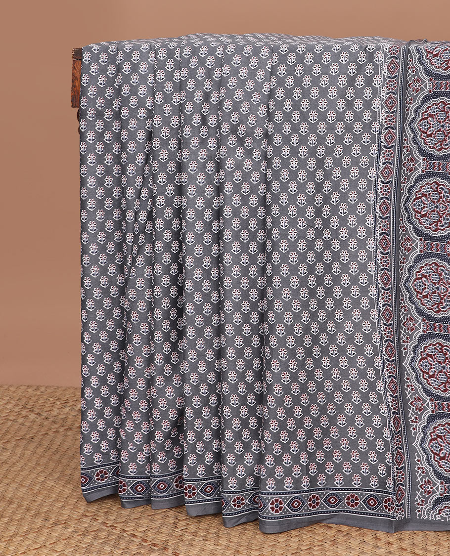 Grey floral motifs printed mul mul cotton saree, ajrakh printed border & ajrakh printed pallu
