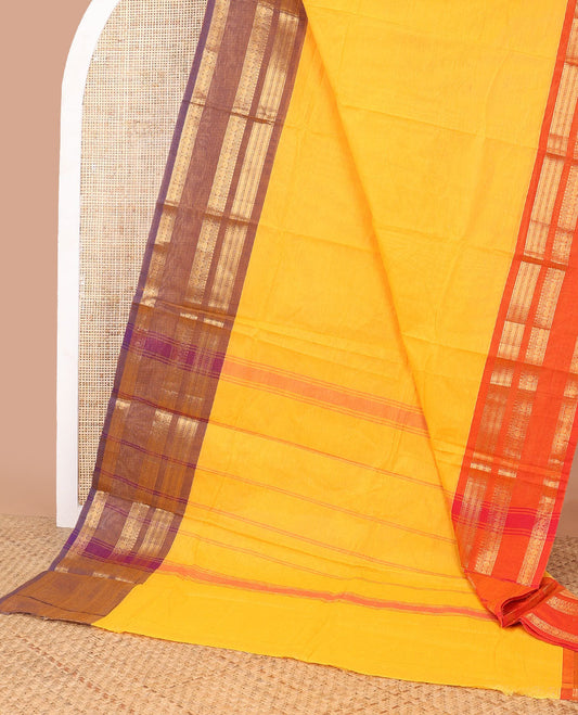 Yellow chettinad cotton saree with ganga jamuna zari design border & striped pallu