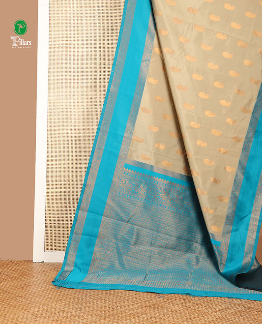 Tan color with rama green mango butta zari design litchi soft silk saree with contrast bentex traditional border & rich weaving pallu along with brocade blouse