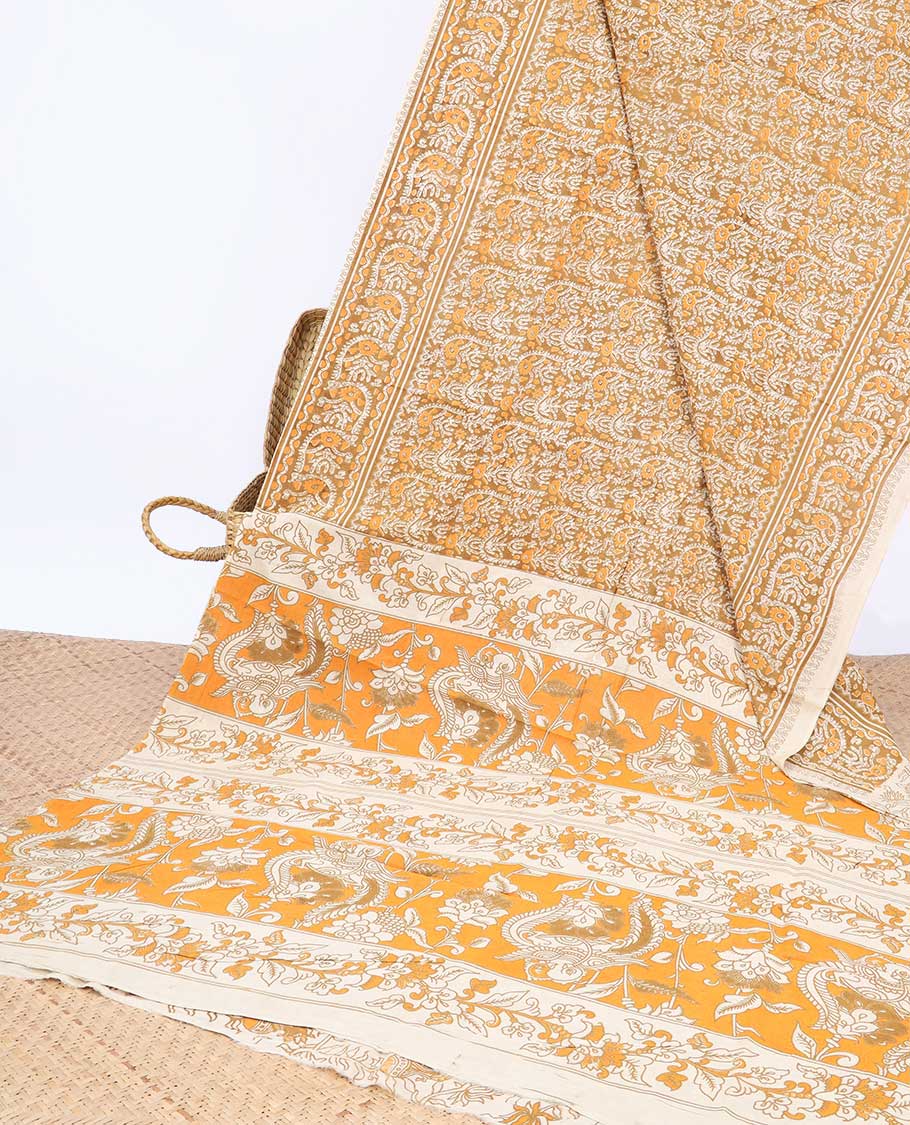 Orange intricately machine-printed kalamkari cotton saree, self-border & contrast pallu of floral print