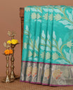 Rama green pochampally-style floral thread-woven chanderi cotton saree, contrast floral zari border & floral design pallu, plain blouse