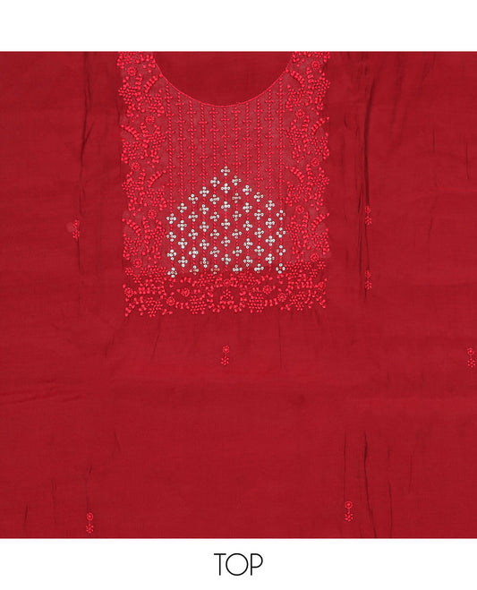 Red material chudidar set, sequins and thread neck embroidered top, plain bottom, and sequins and thread embroidered dupatta