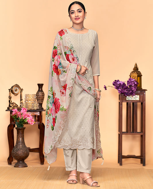 Beige churidar material set, thread embroidered with stone work top, matching bottom, and floral print with thread embroidered scallop dupatta