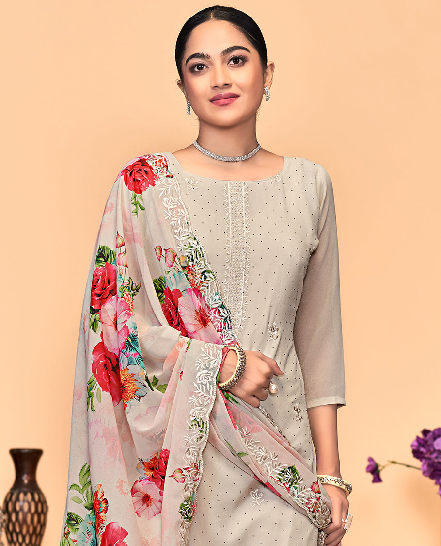 Beige churidar material set, thread embroidered with stone work top, matching bottom, and floral print with thread embroidered scallop dupatta