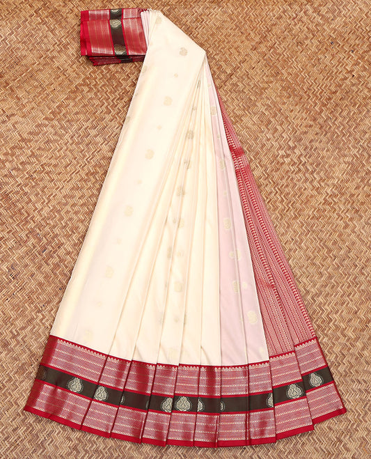 Cream Budget Silk Saree, Enthralled with Zari Buttas on Its Body, Complemented by a Contrast Traditional Zari Design Border, Pallu of Geometric Designs, and Paired with a Contrast Blouse